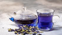 Organic blue tea Anchan, Clitoria, Butterfly Pea in glass cup an