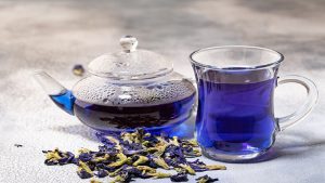 Organic blue tea Anchan, Clitoria, Butterfly Pea in glass cup an